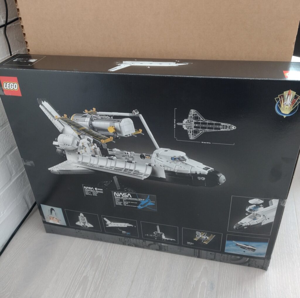 Photo of Lego Space Shuttle box showing the shuttle Discovery with arm lifting Hubble Space Telescope out of the cargo bay
